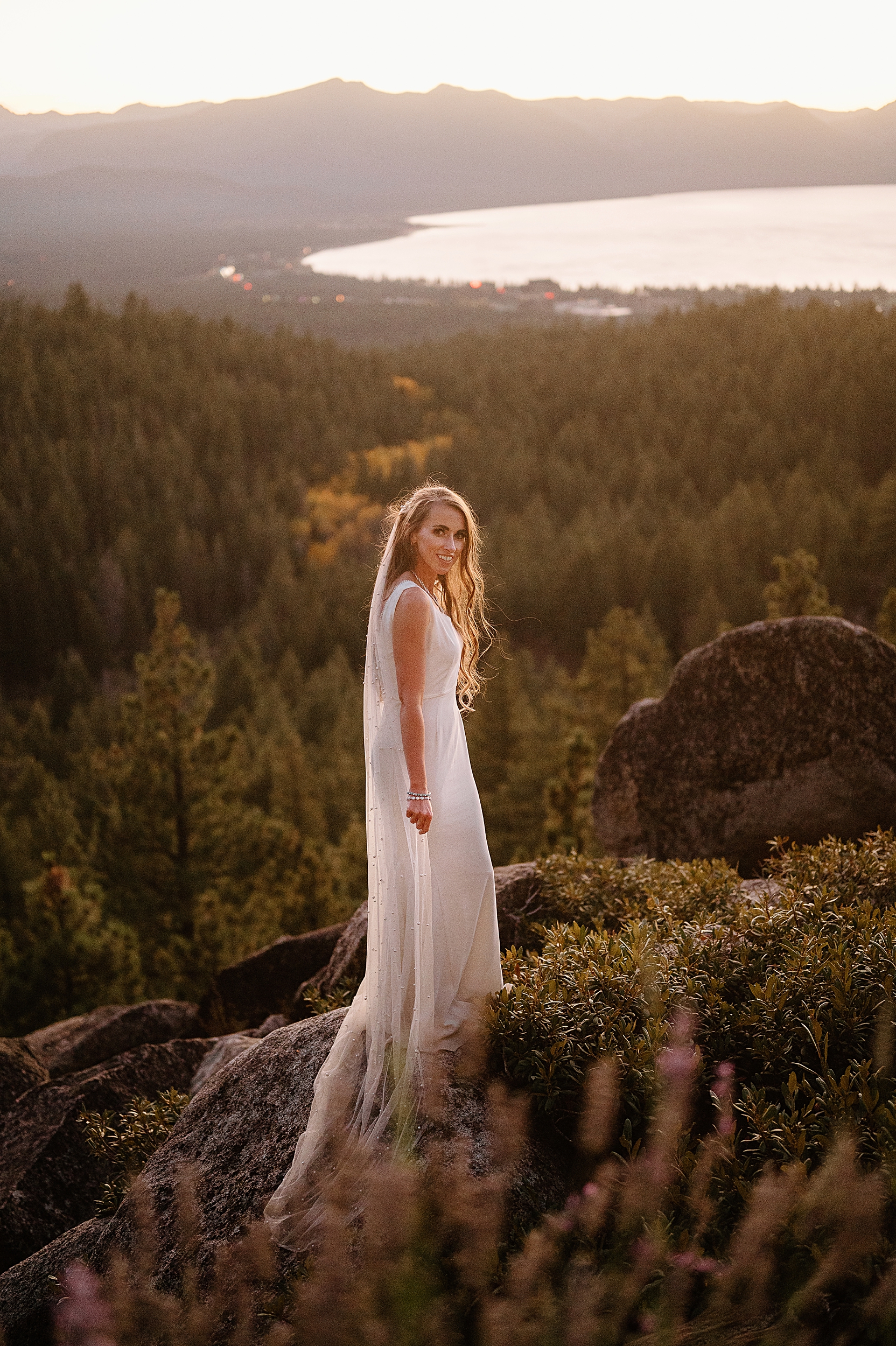 Bride standing on mountain at Tahoe Blue Estate