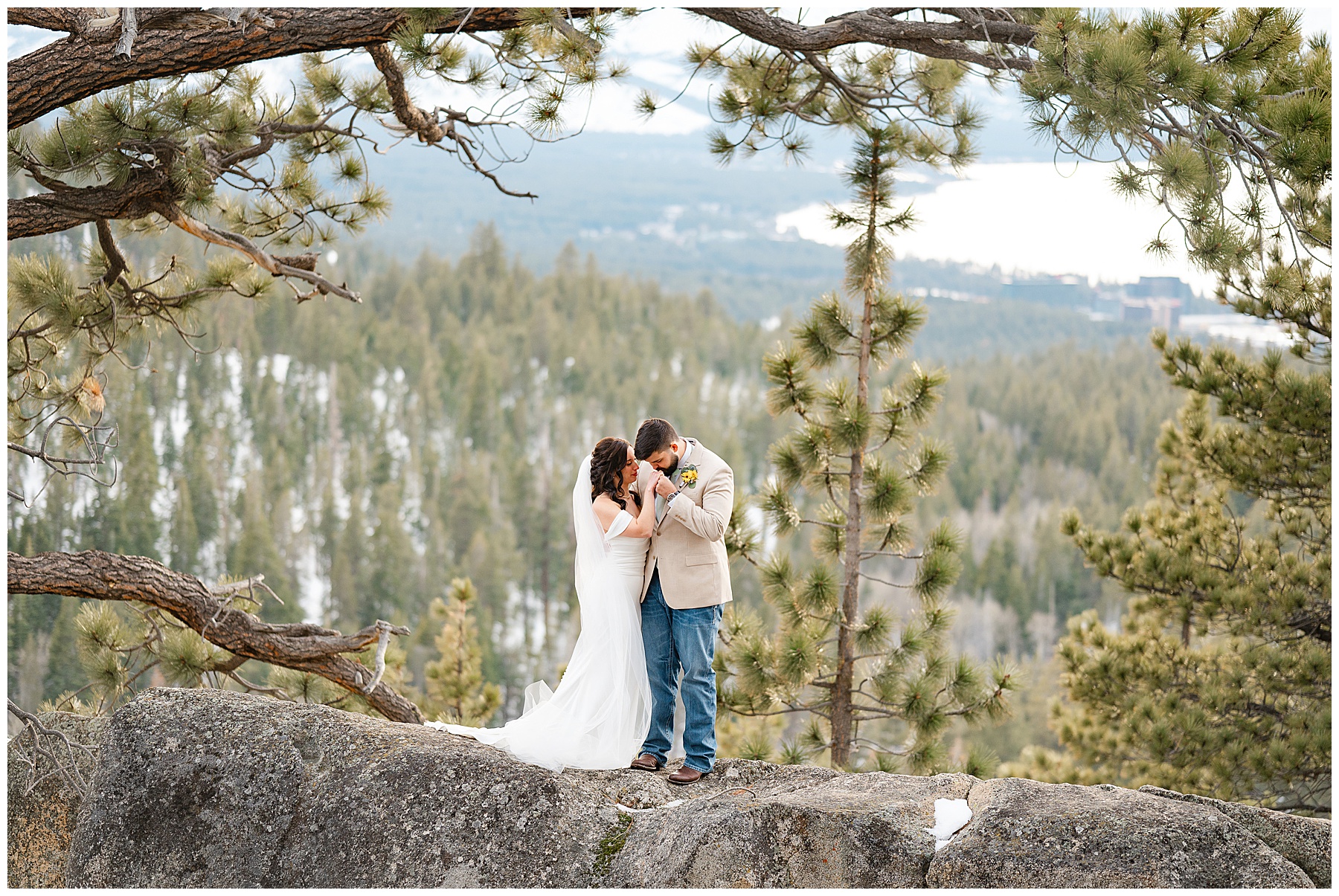 Couple standing on boulder at tahoe blue estate