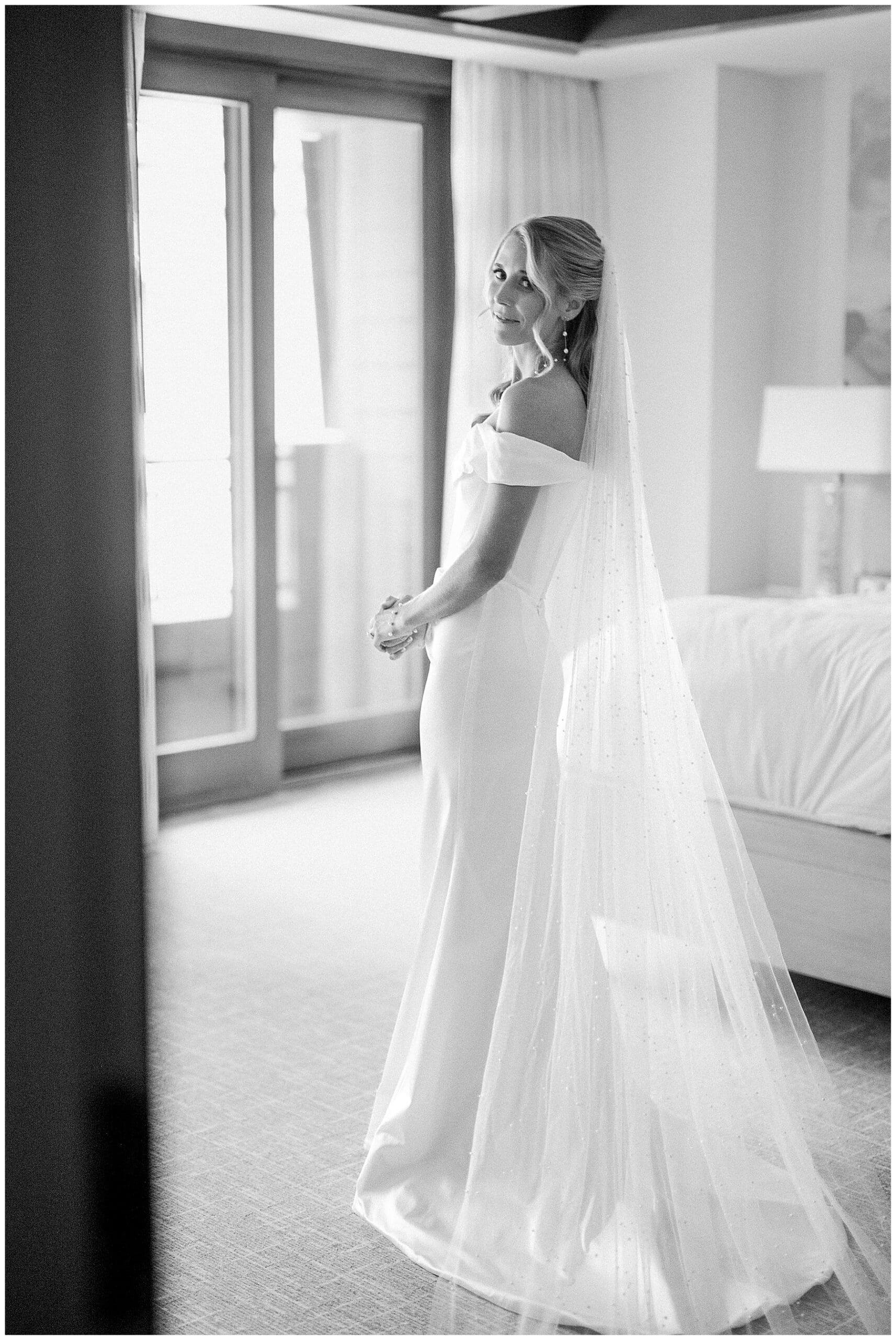 Sweet getting ready moment with bride, mom, and sister at Ritz-Carlton suite