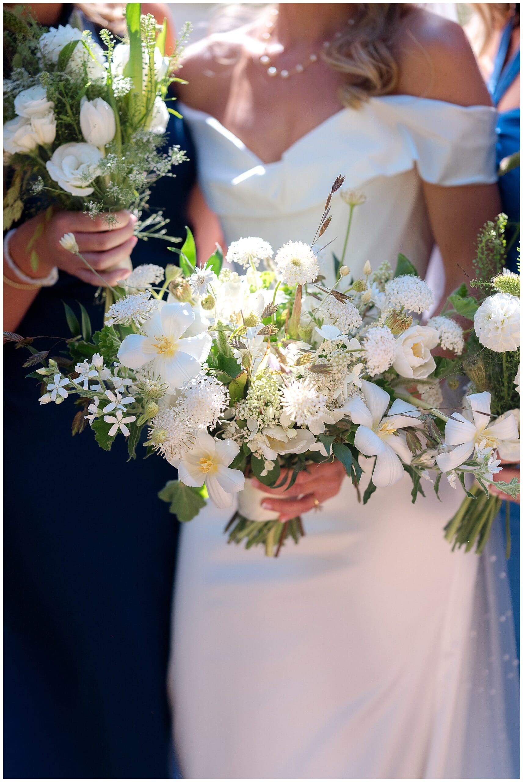 Elegant green and white wedding floral decor by Love & Lupines