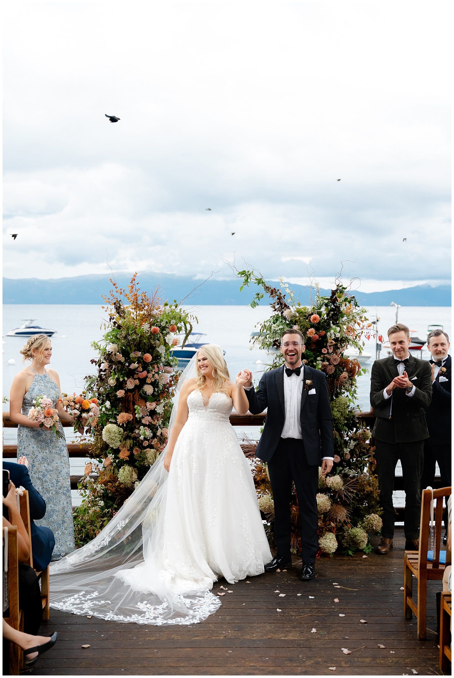 Romantic lakeside ceremony at Sunnyside with asymmetrical floral installations