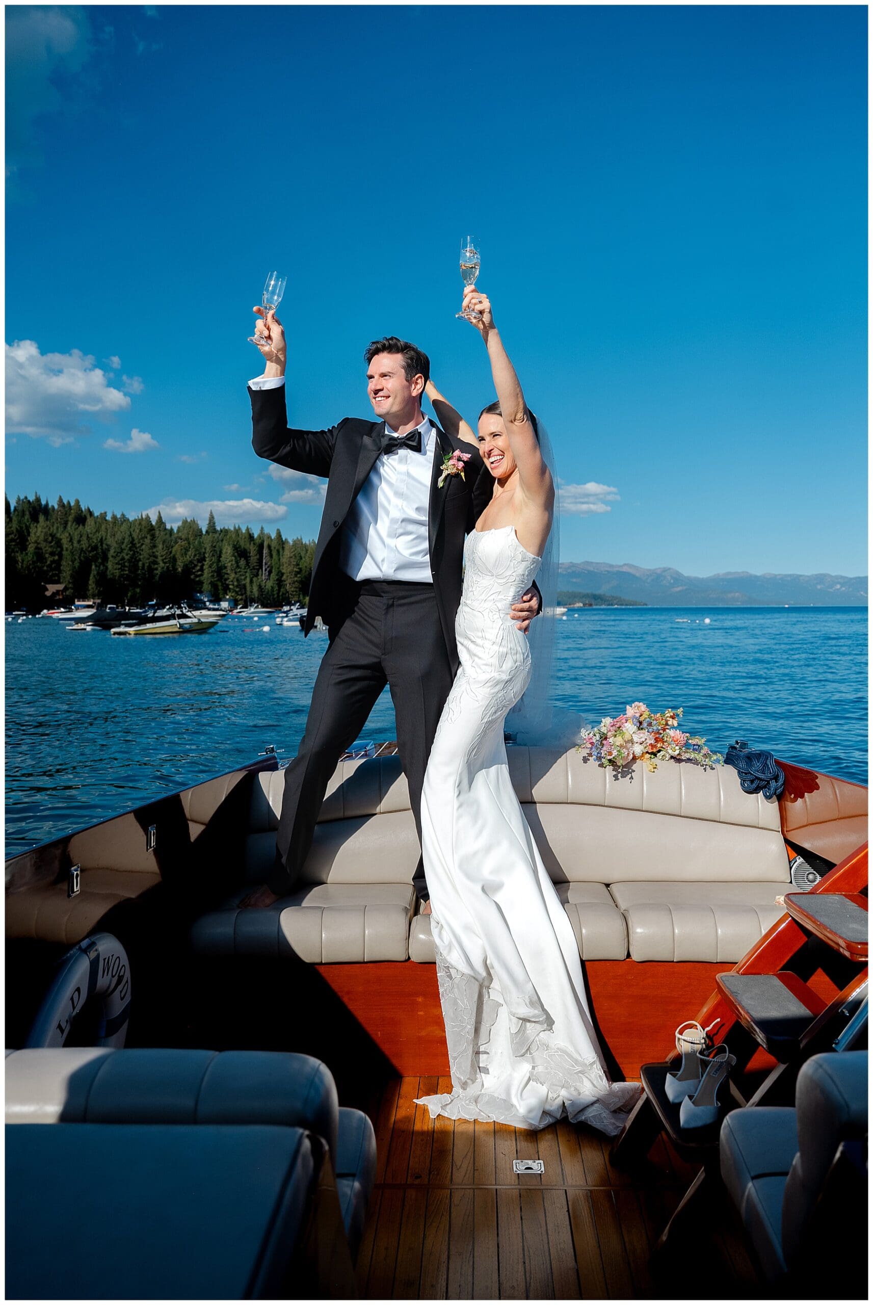 Bride arriving by boat for Sunnyside Lake Tahoe wedding ceremony