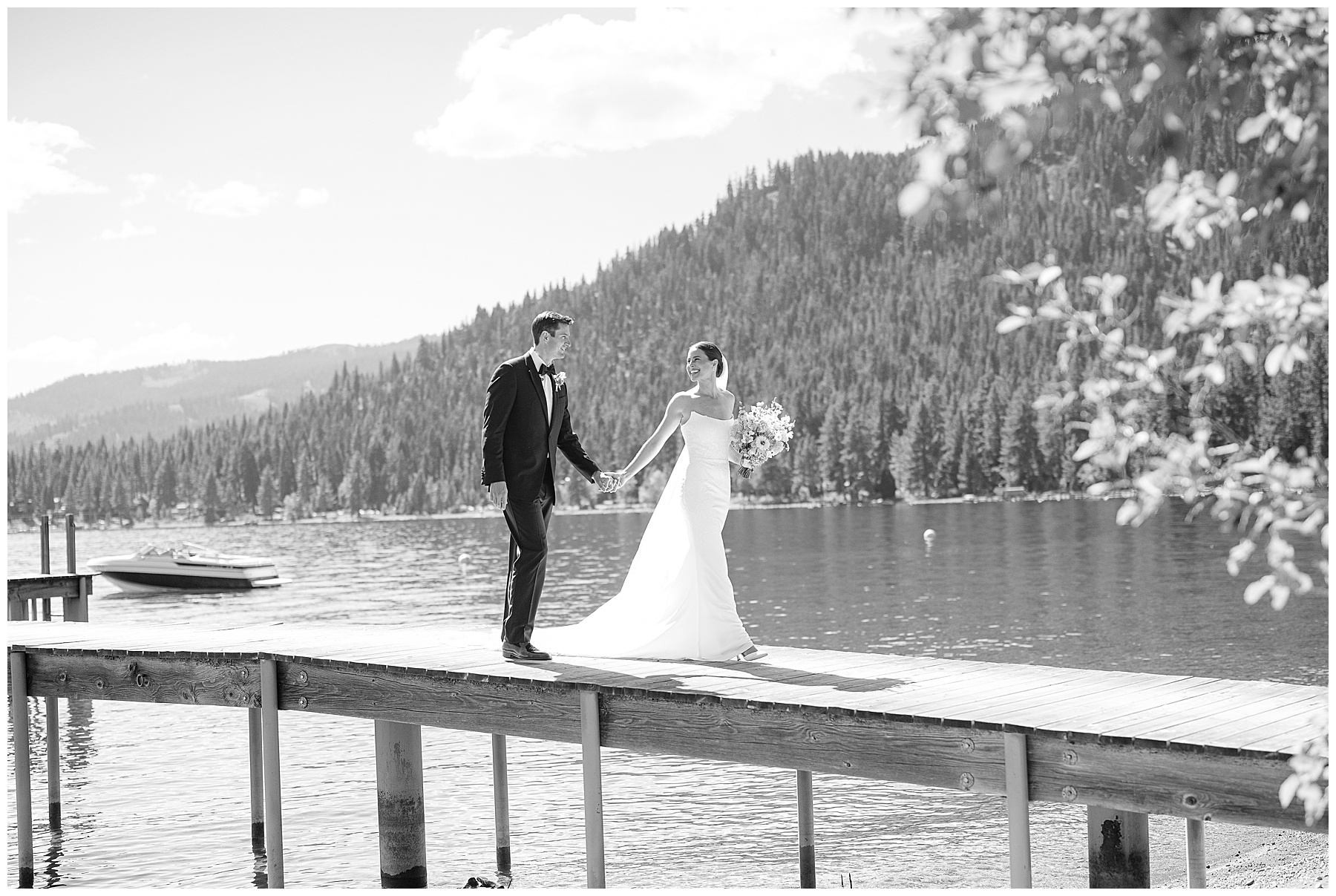 Emotional first look on private pier before Sunnyside Lake Tahoe wedding